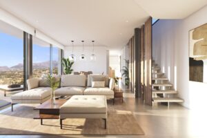 Soggiorno moderno luminoso con vista mare, cucina a vista e balcone panoramico.