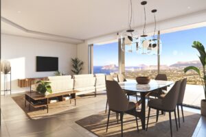 Open-plan modern living and dining room with stunning ocean views and floor-to-ceiling windows.